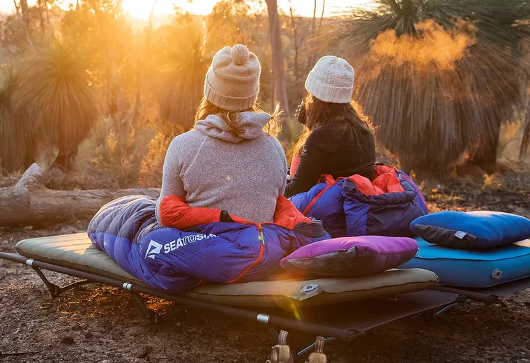 Campers with Sea to Summit sleeping gear at sunset