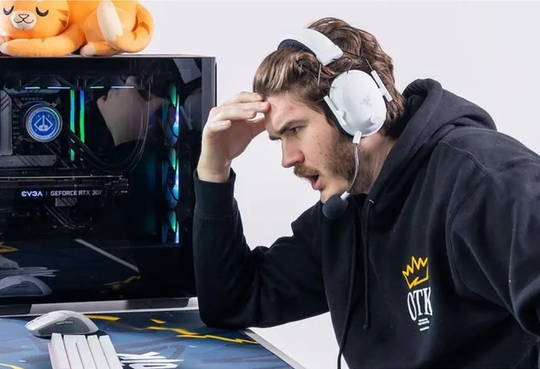 Starforge gaming PC with a player at the desk